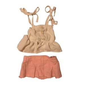 NWOT 2 piece outfit  0-3 m, pink skirt and ruffled tan top by Bailey’s Blossom